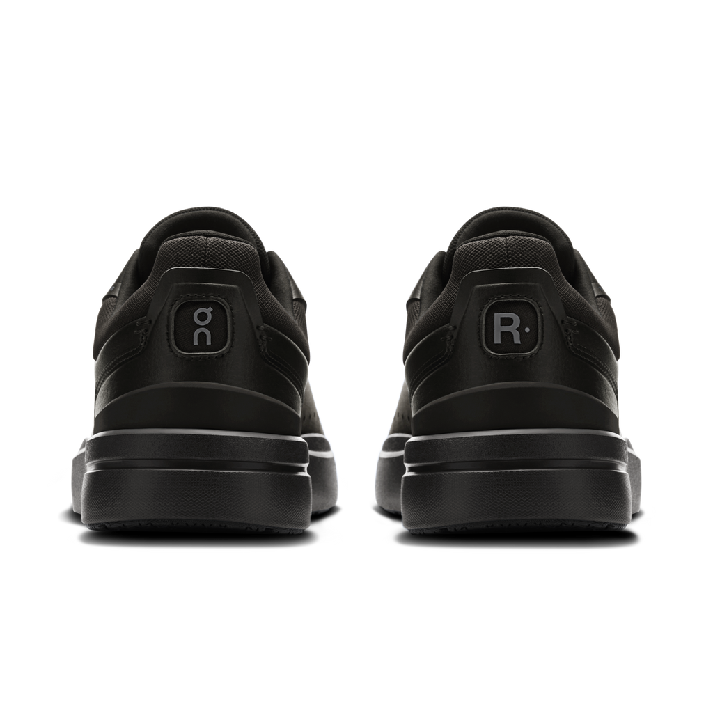 On men's black sneakers, heel view with On logo and rear R emblem