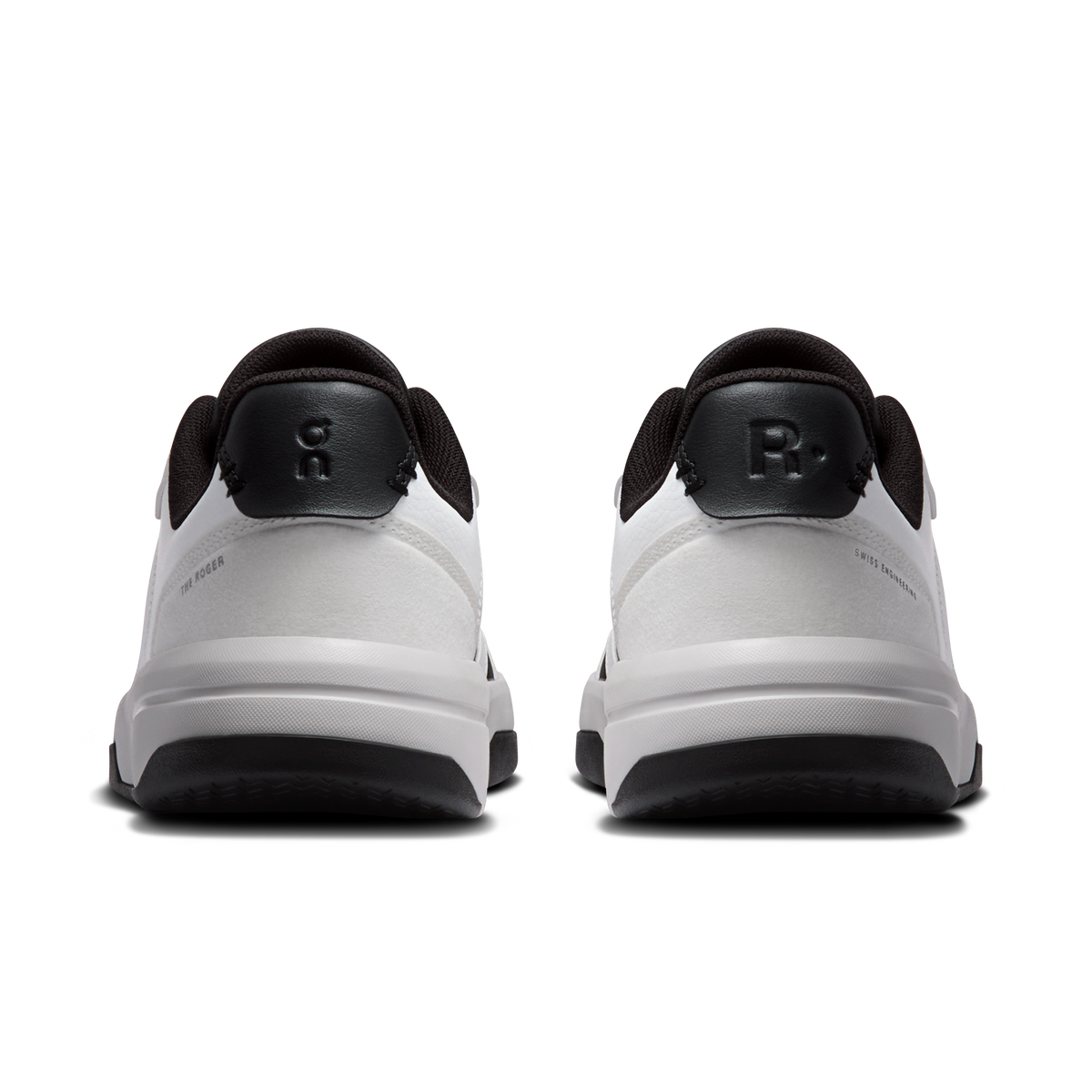 Back view of white and dark gray sneakers with heel loop and cushioned sole