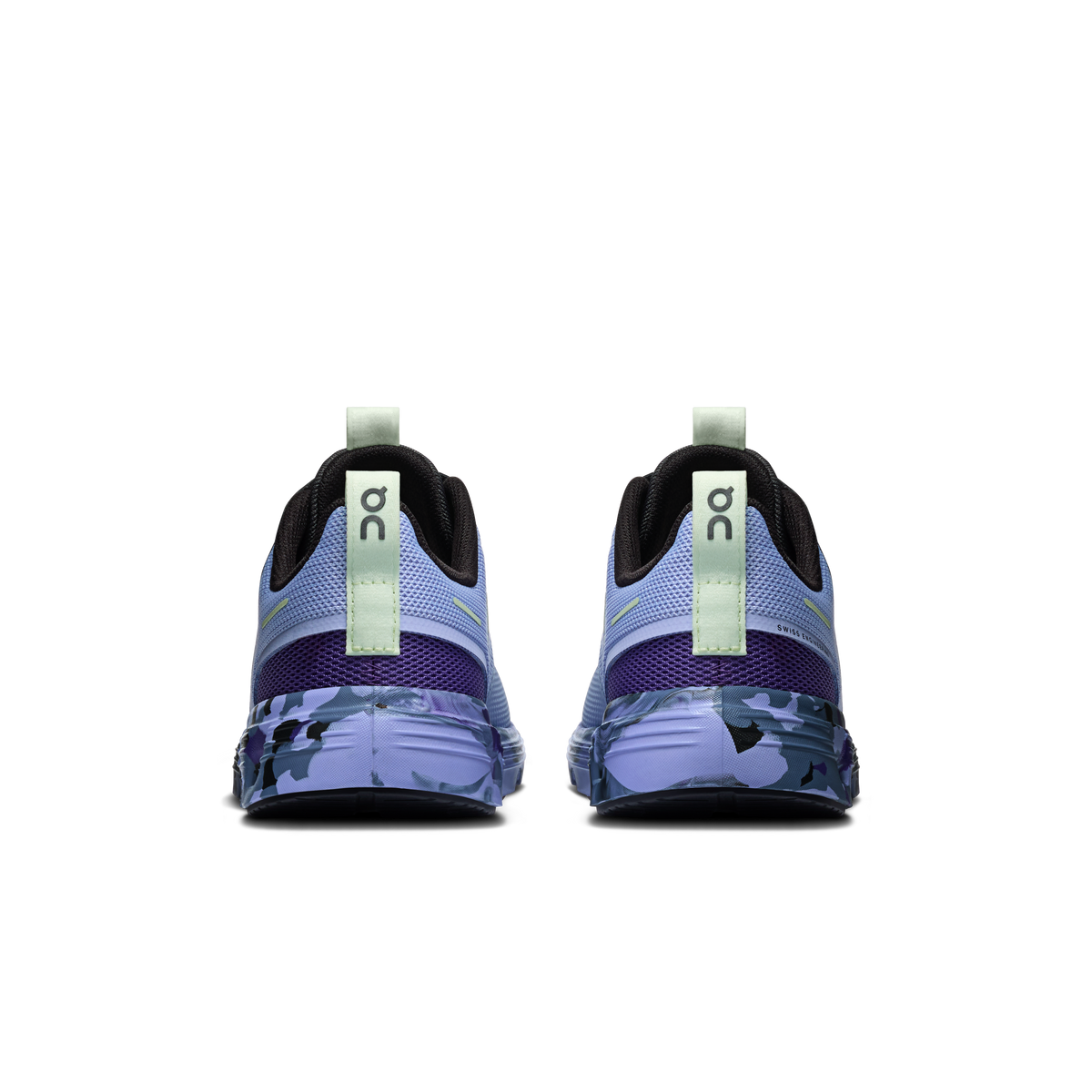 Kids' heel view sneaker in light blue with black collar and green pull tab