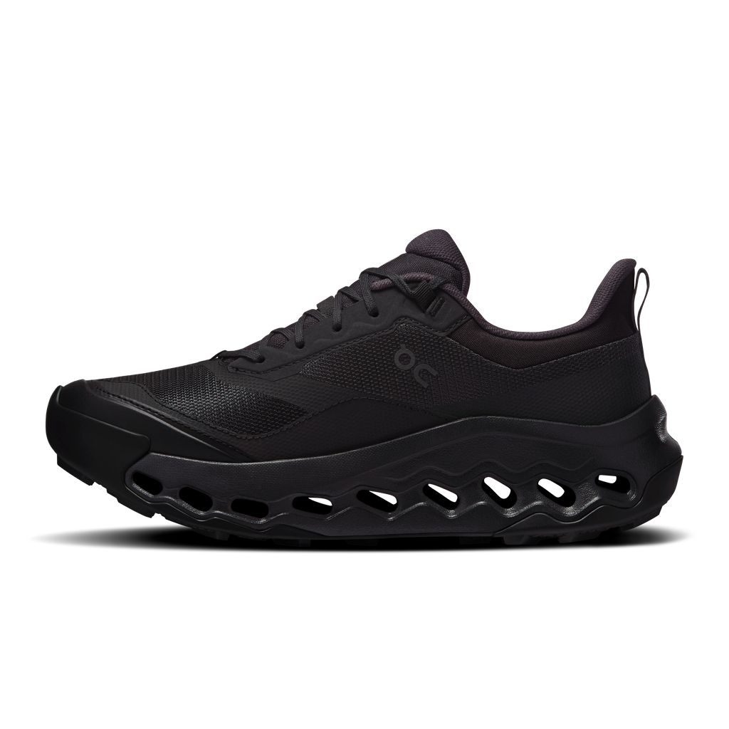 Women's waterproof running shoes black, side profile with underfoot cushioning pods