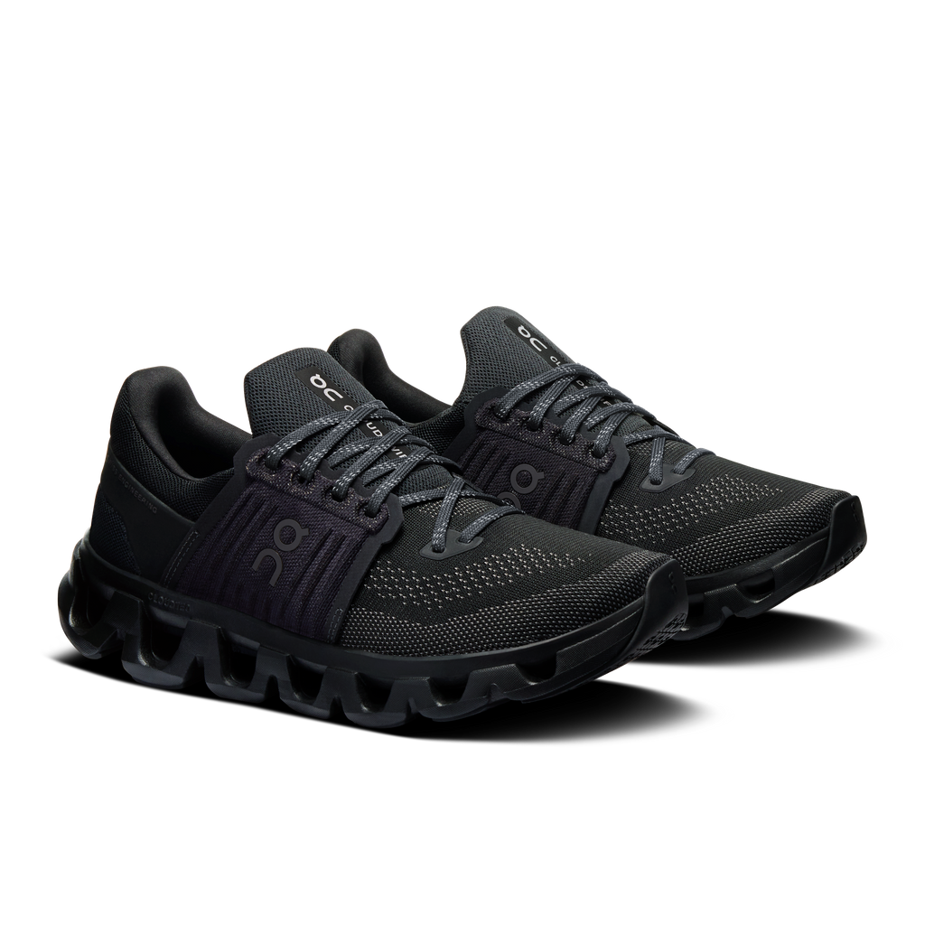 Women's black lace-up running shoes with mesh upper and side On logo