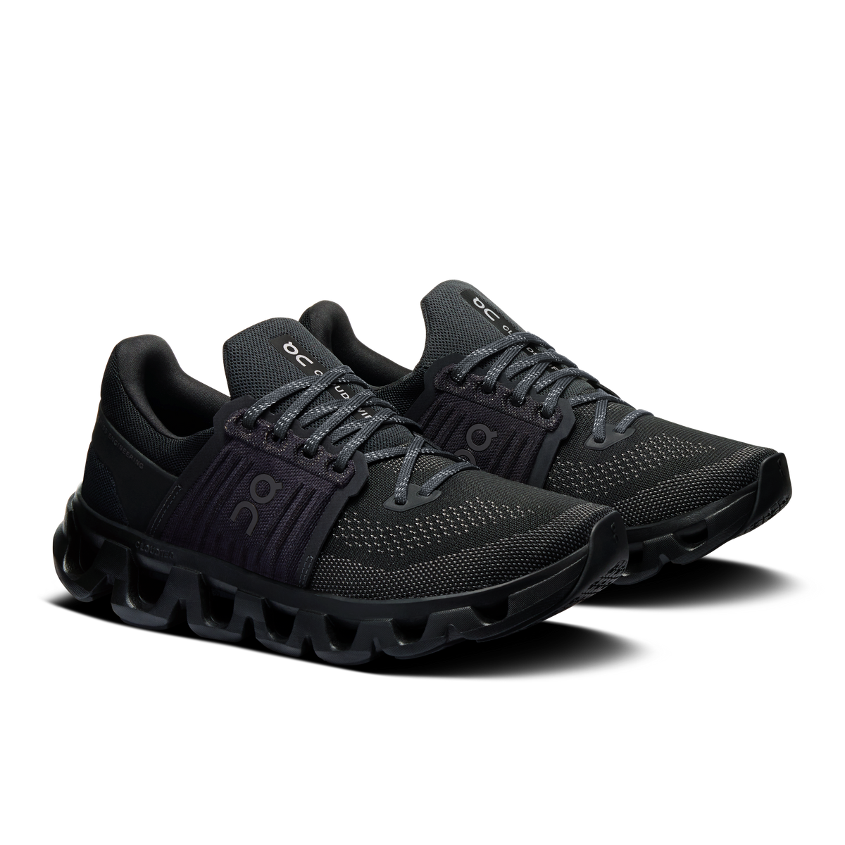 Women's black lace-up running shoes with mesh upper and side On logo