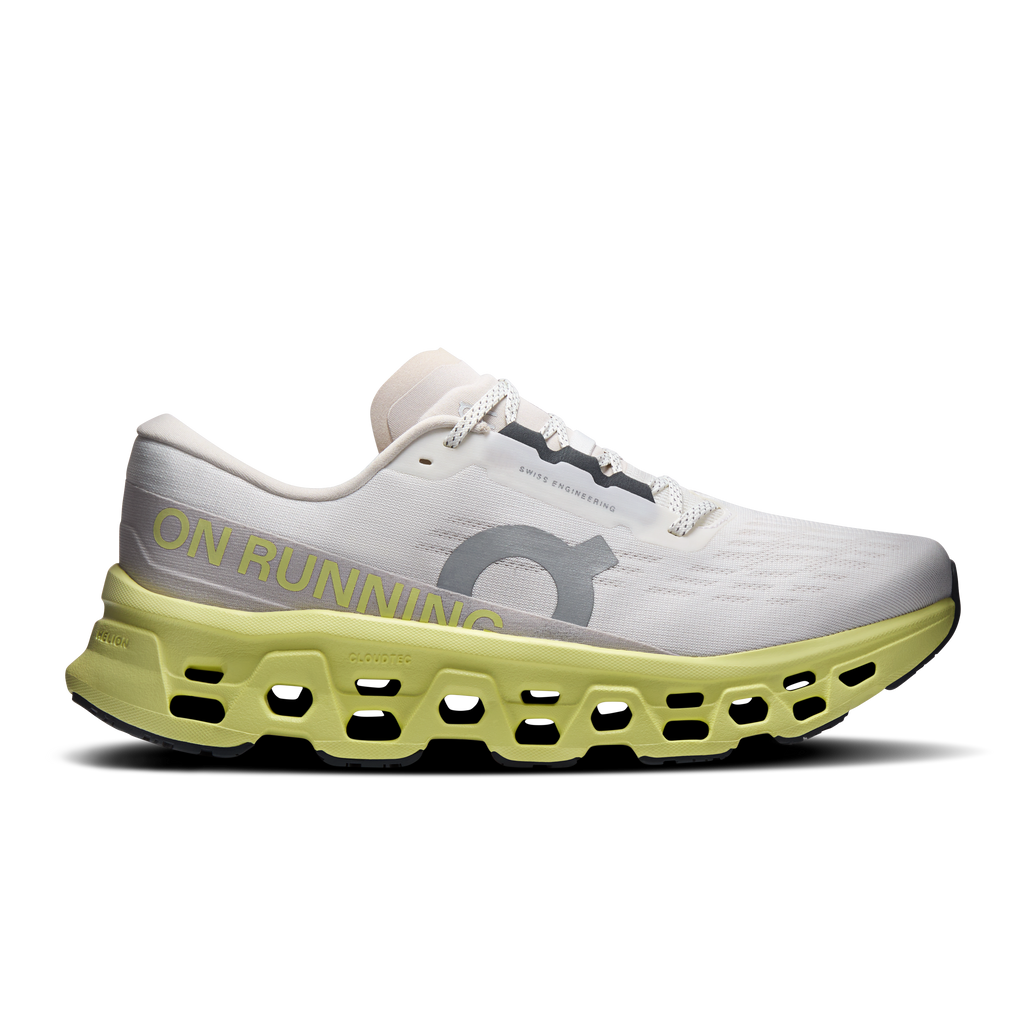 Men's ivory running shoes with neon-lime CloudTec-style sole, front quarter view