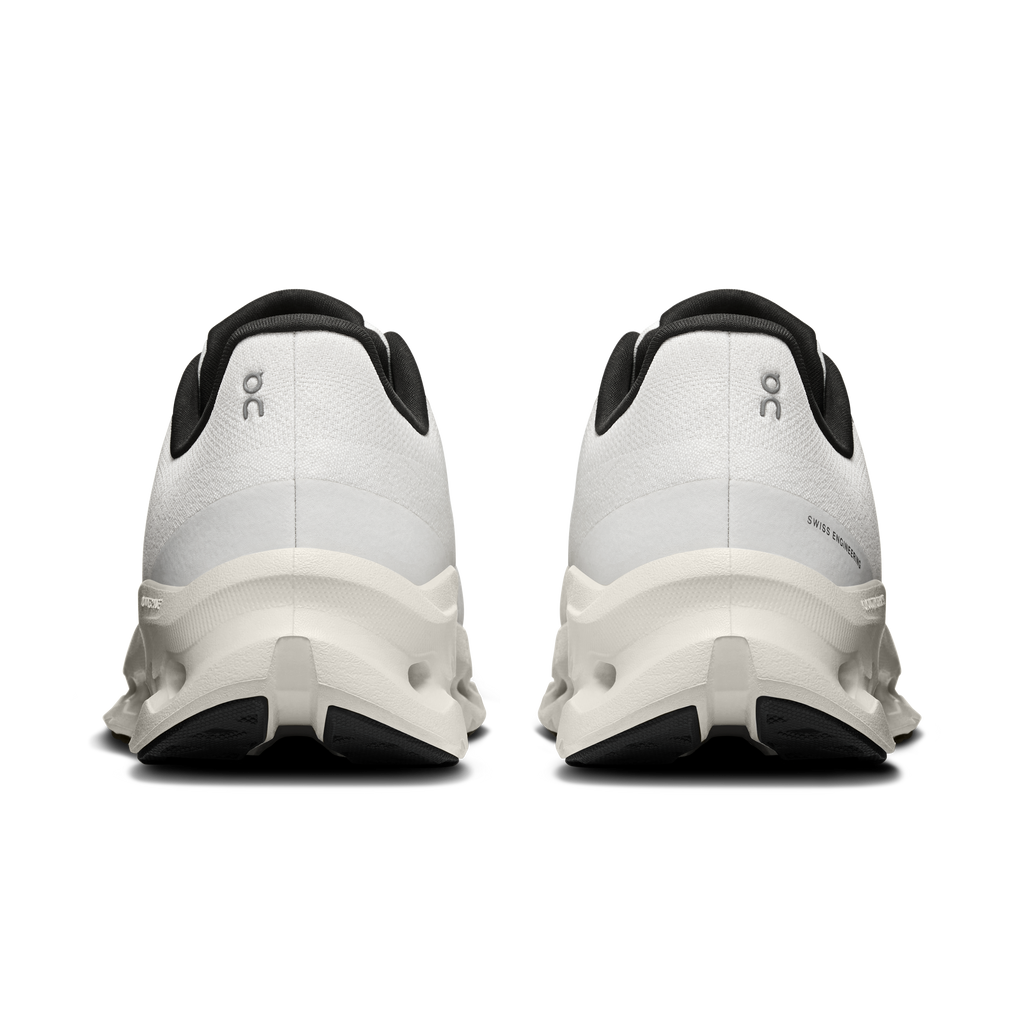 Women's running shoes heel view with padded collar and black side details