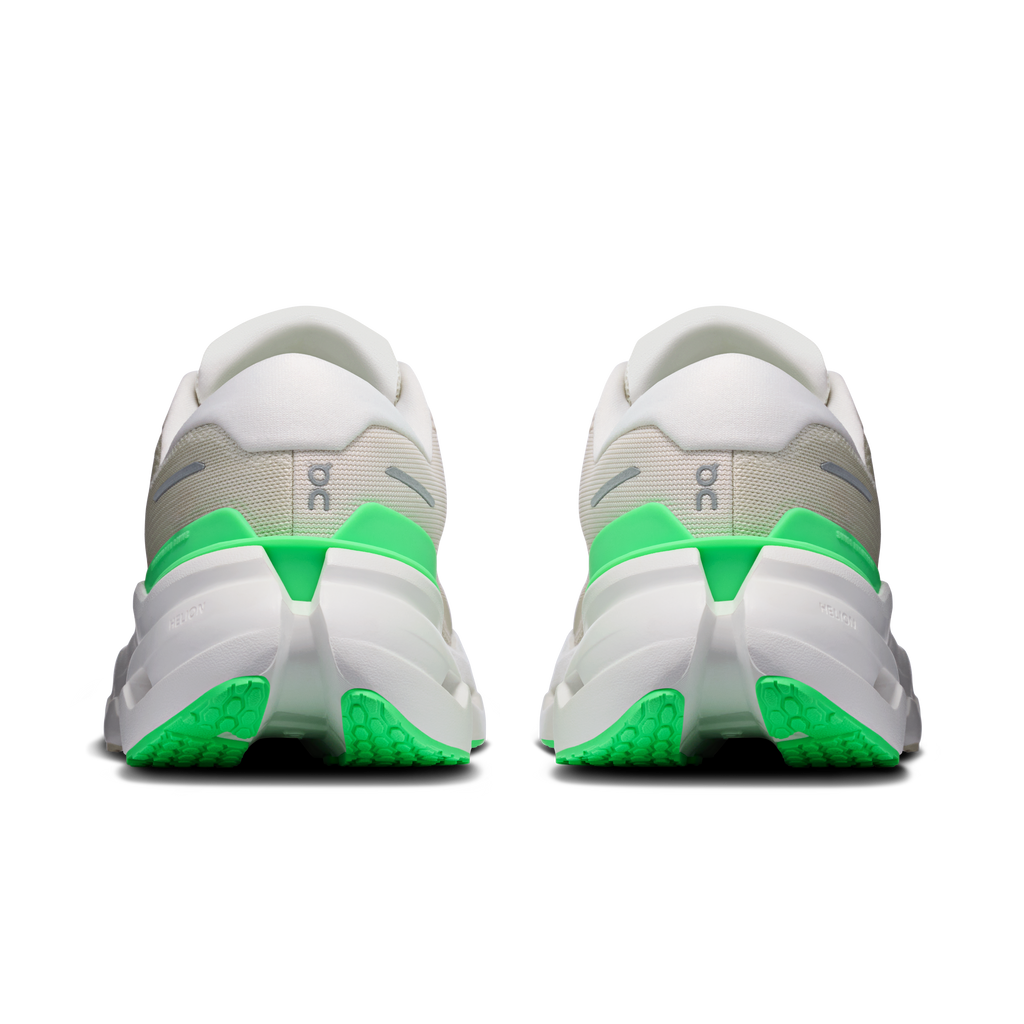 Women's running shoes heel view with green stripe and cushioned white back panel
