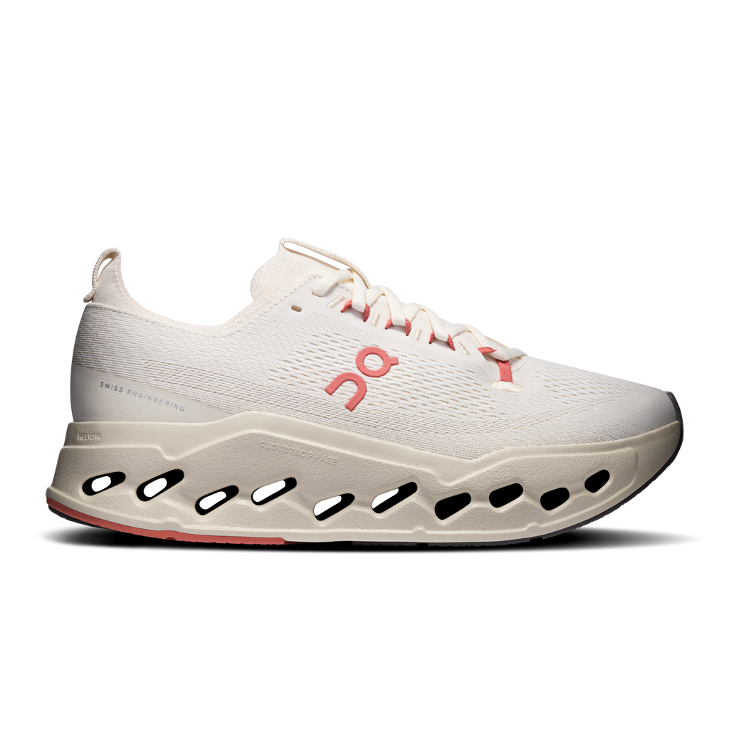 On Cloudsurfer Max running shoes with ivory knit upper, red laces, and CloudTec sole