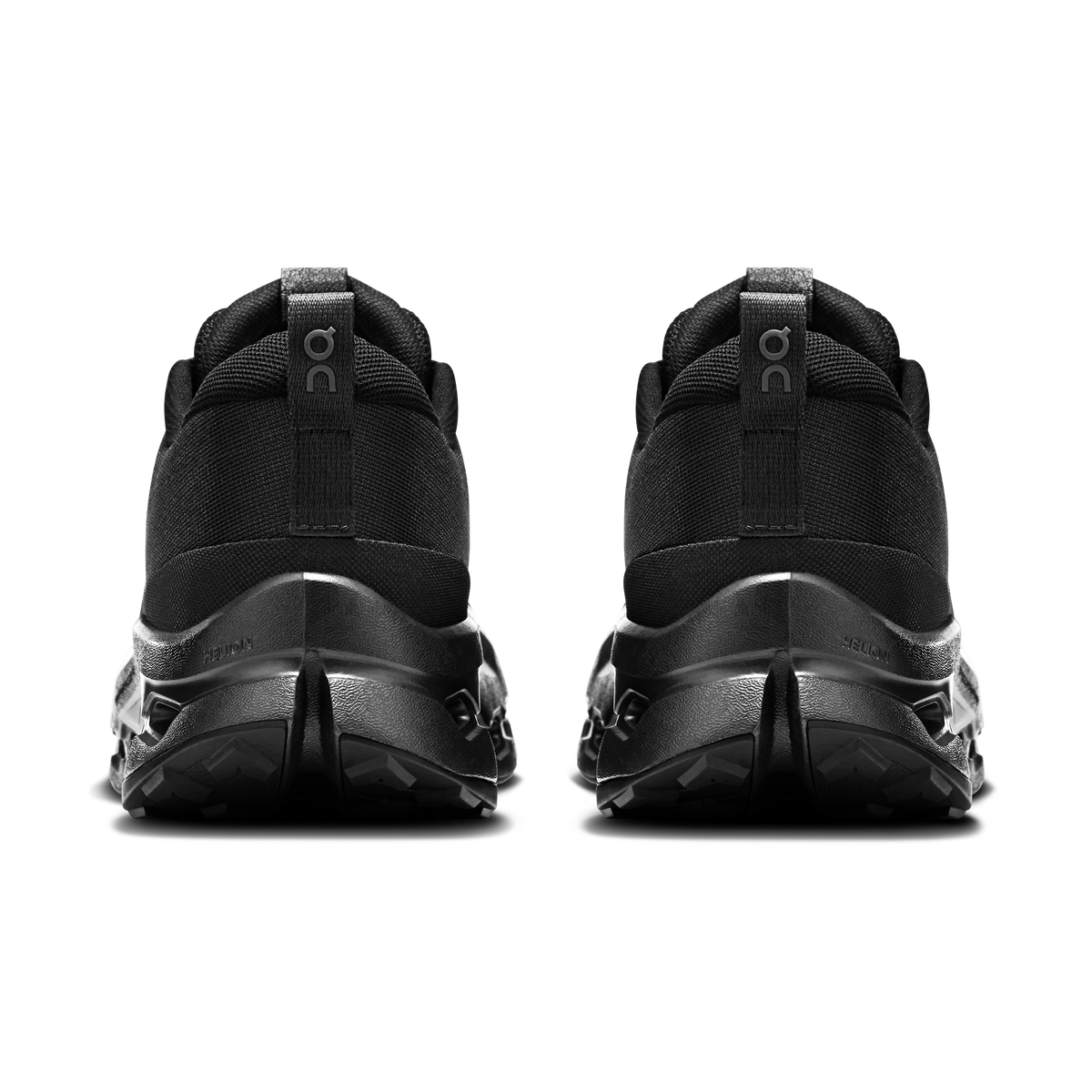 Men's black trail running shoes, rear view with pull tab and cushioned heel