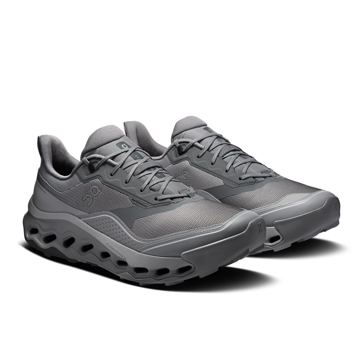 Men's waterproof running shoes, gray lace-up pair, chunky CloudTec sole