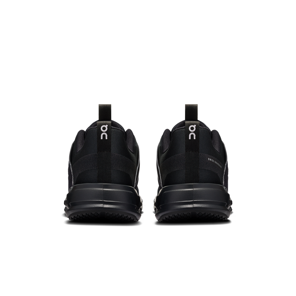 Kids' black sneakers rear view with cushioned heel and On branding