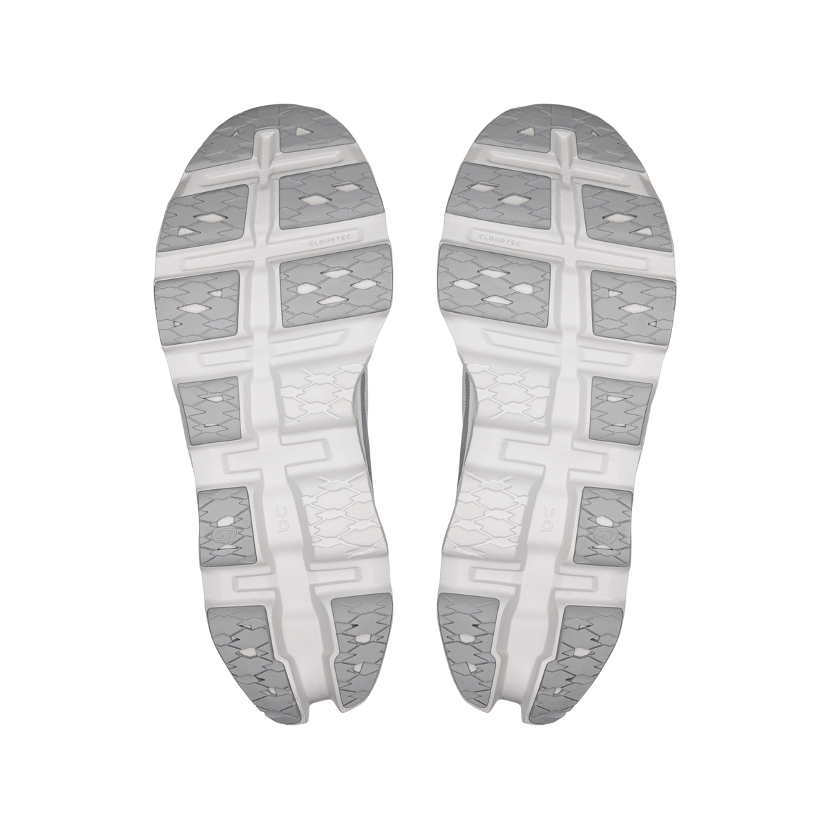 Men's running shoe outsoles showing patterned traction and molded cushioning pods