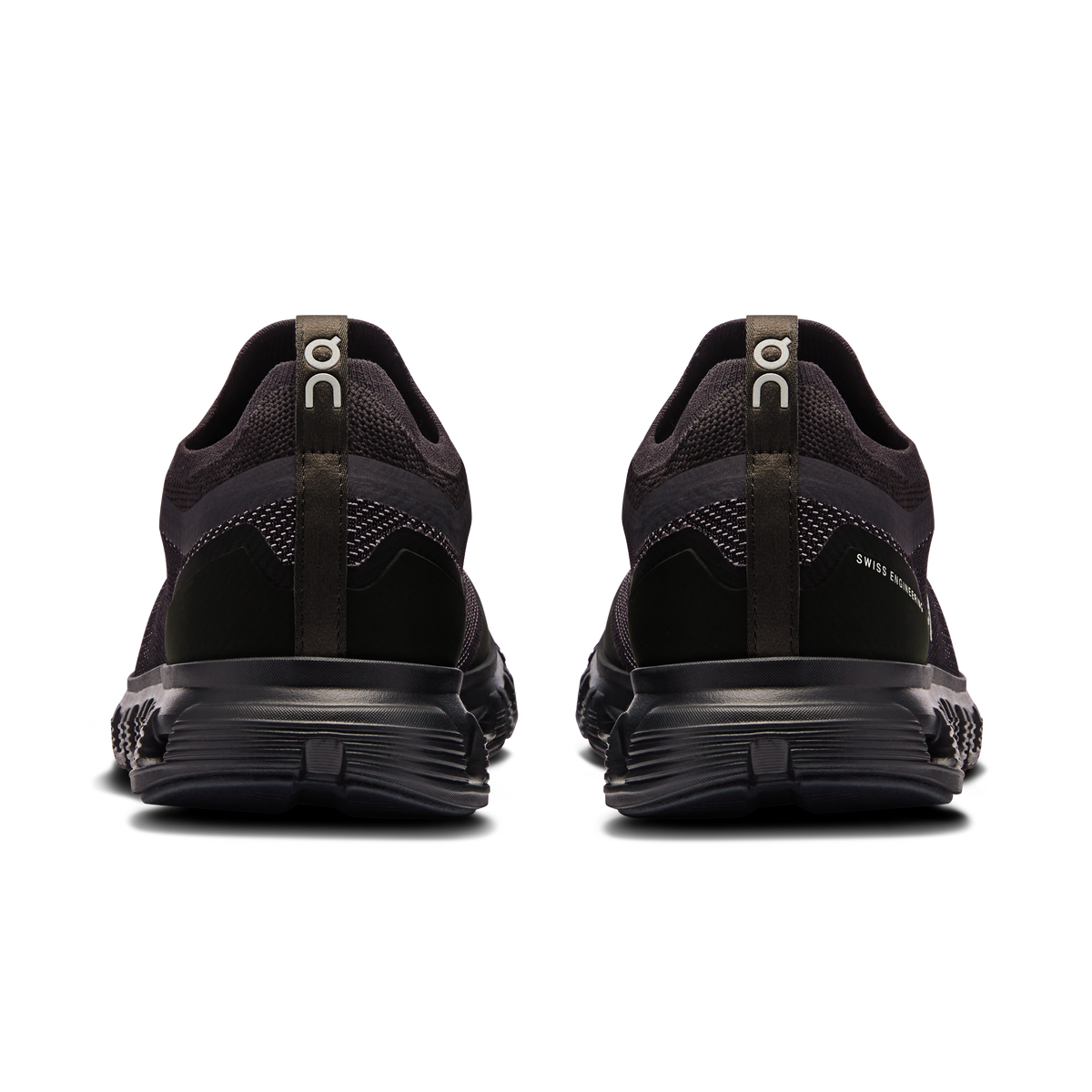 Women\u2019s black running shoes, heel view with pull tab and cushioned midsole