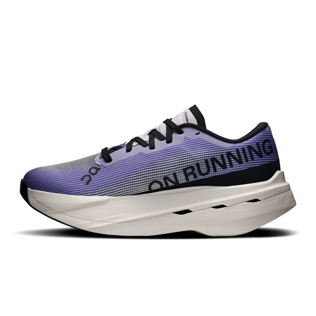 On Cloudboom Volt running shoes, purple knit upper with ON RUNNING text and white sole