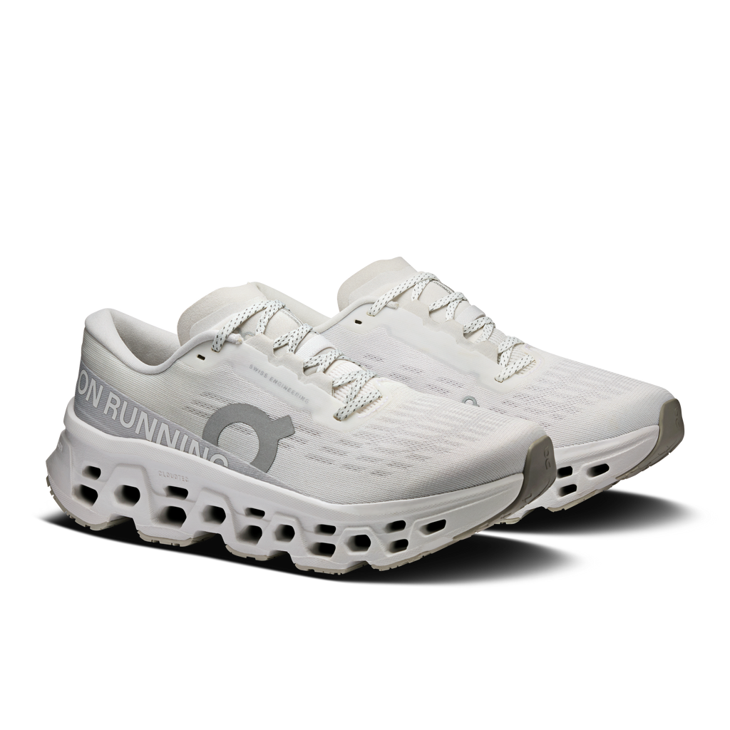 Women's white running shoes with lace-up mesh upper and cushioned cloud pod midsole
