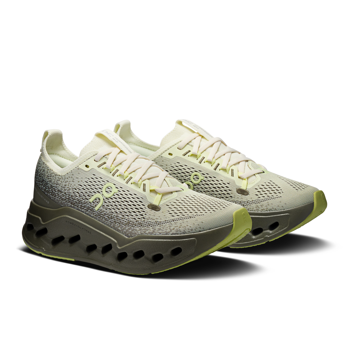 Light olive knit lace-up runner with neon-olive edge and CloudTec cutouts