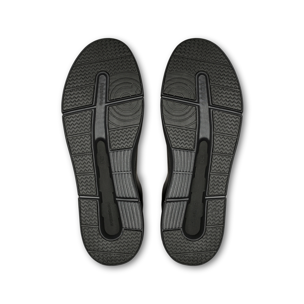 On men's black sneaker outsoles with textured tread and heel stabilizers