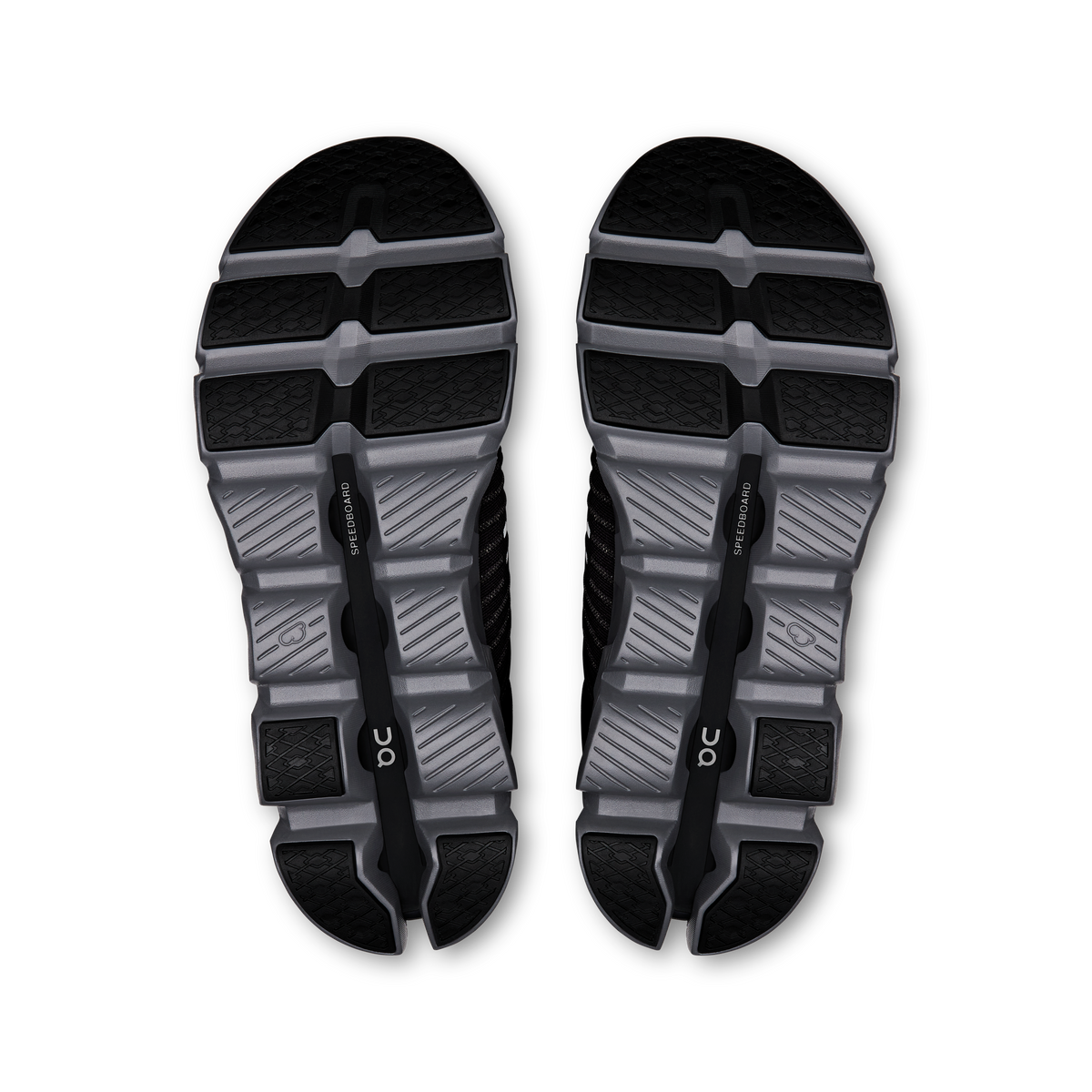 Pair of shoe outsoles with CloudTec-style cushioning, dark and light gray.