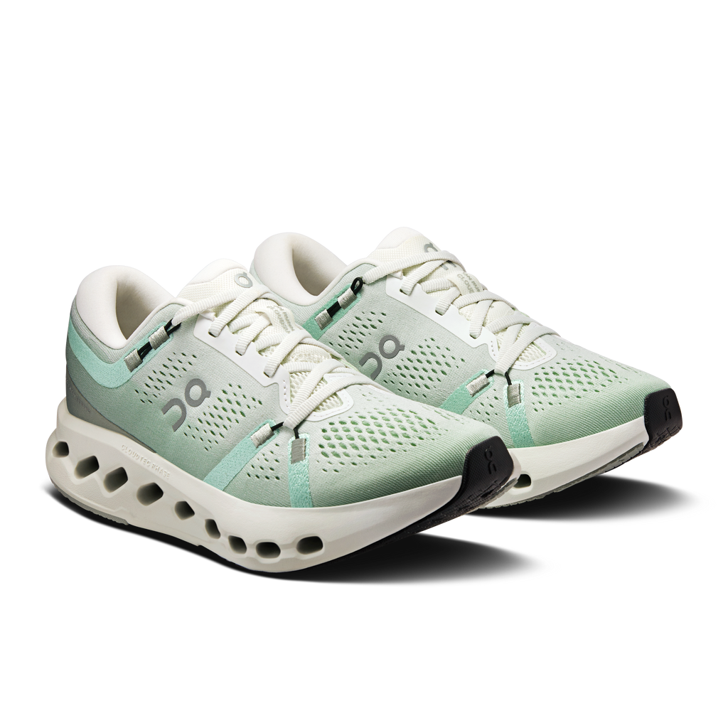 Women’s lace-up running shoes with mint perforated upper and CloudTec midsole
