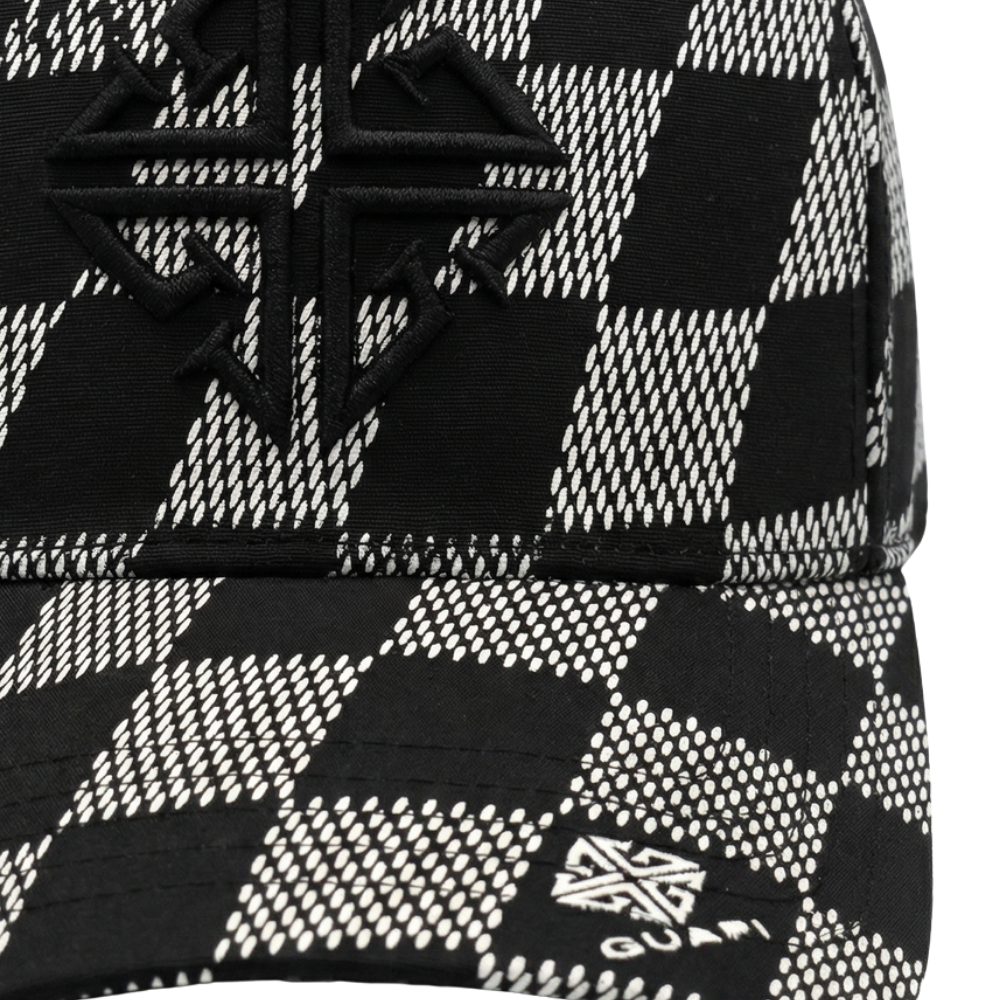 Men's black-and-grey checkerboard cap, close-up of front patch and logo