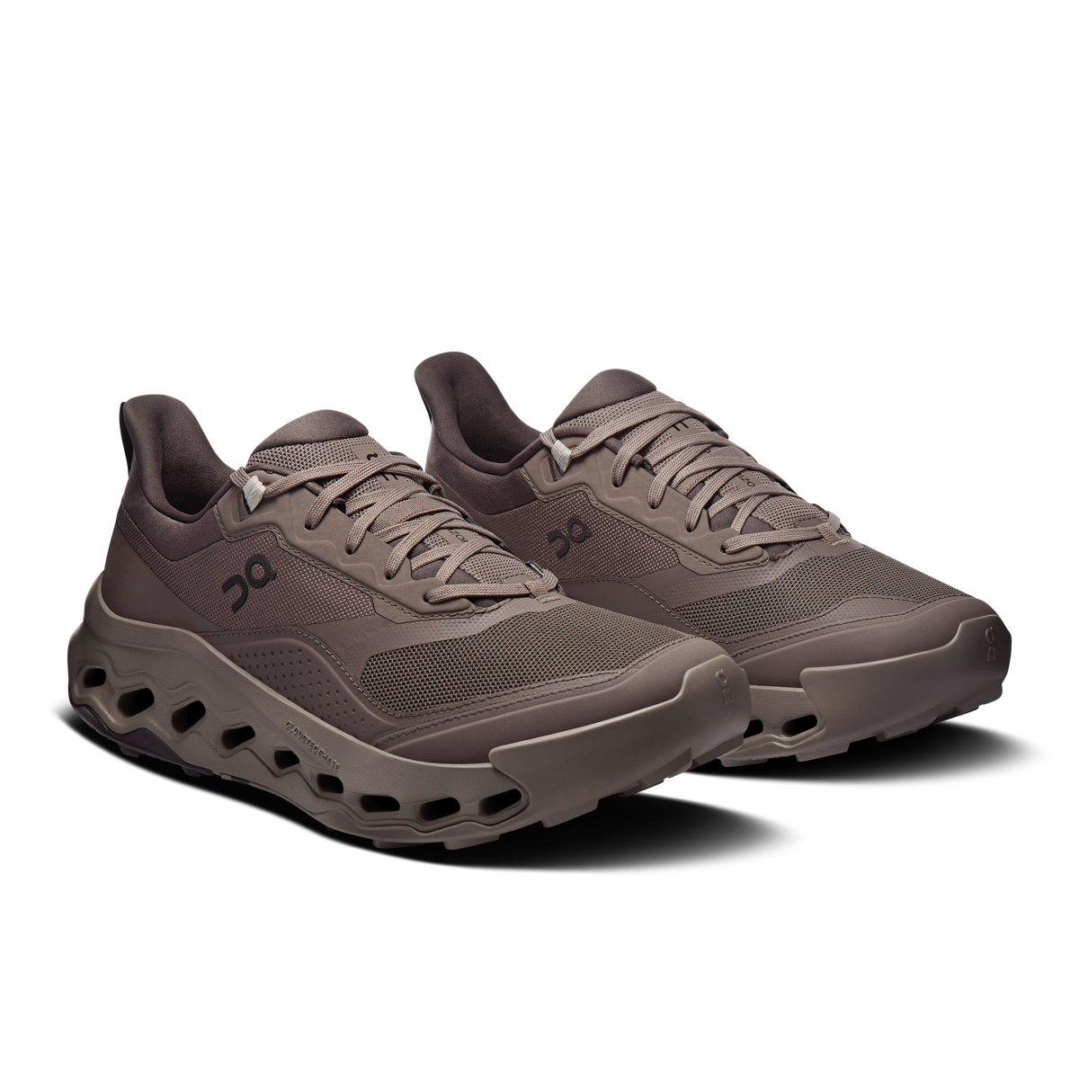 Men's lace-up running shoes, side view, taupe mesh upper and CloudTec-style sole.