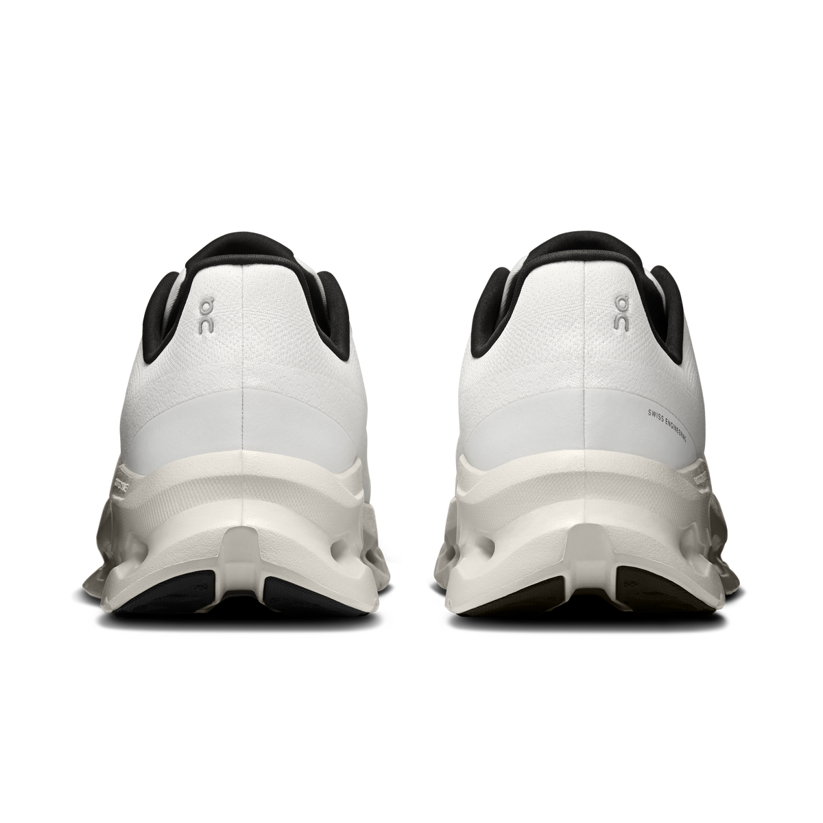 On Cloudtilt men's shoes, rear view with pearl white heel and black pull tabs