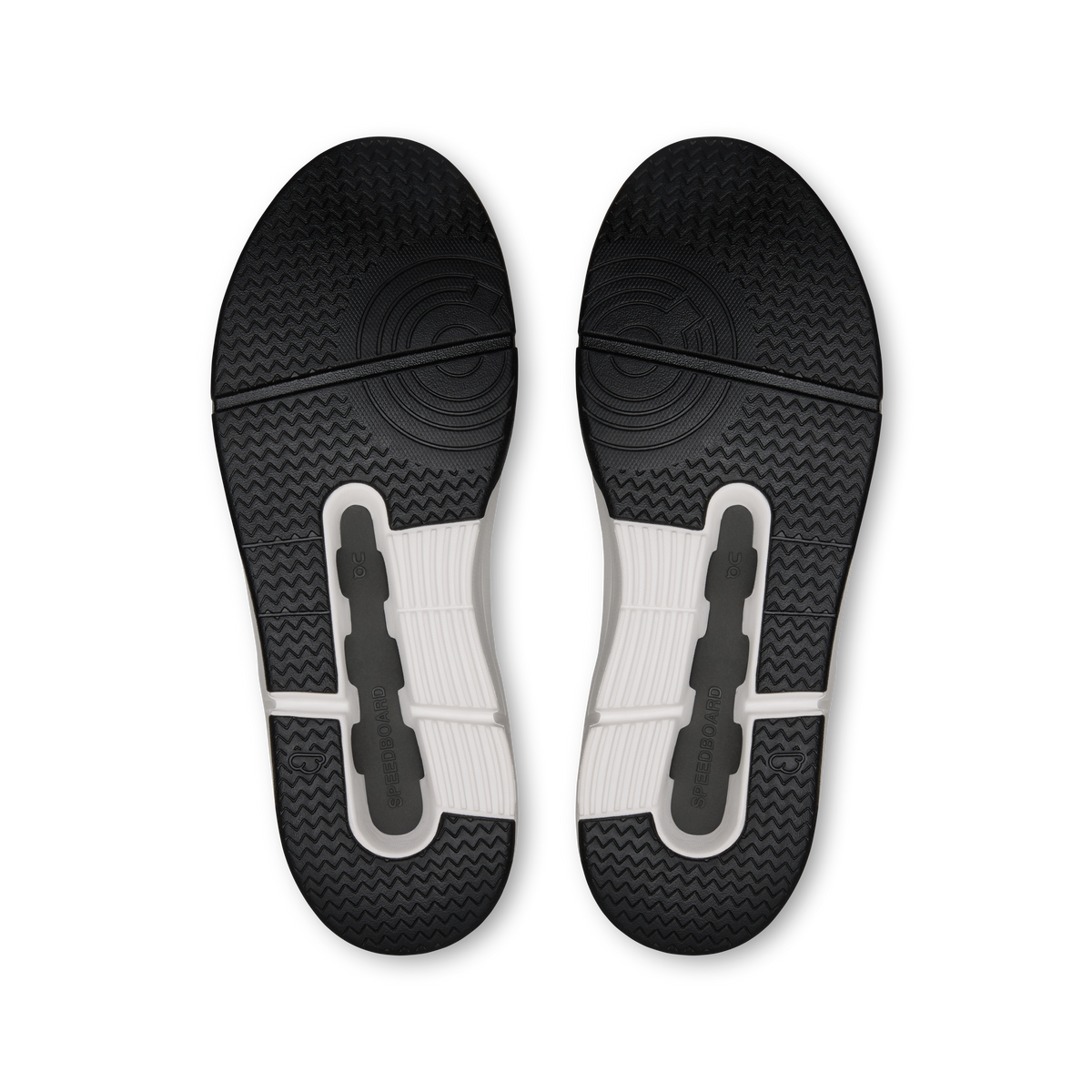 Black rubber outsole with textured tread and cushioned U-shaped traction pads