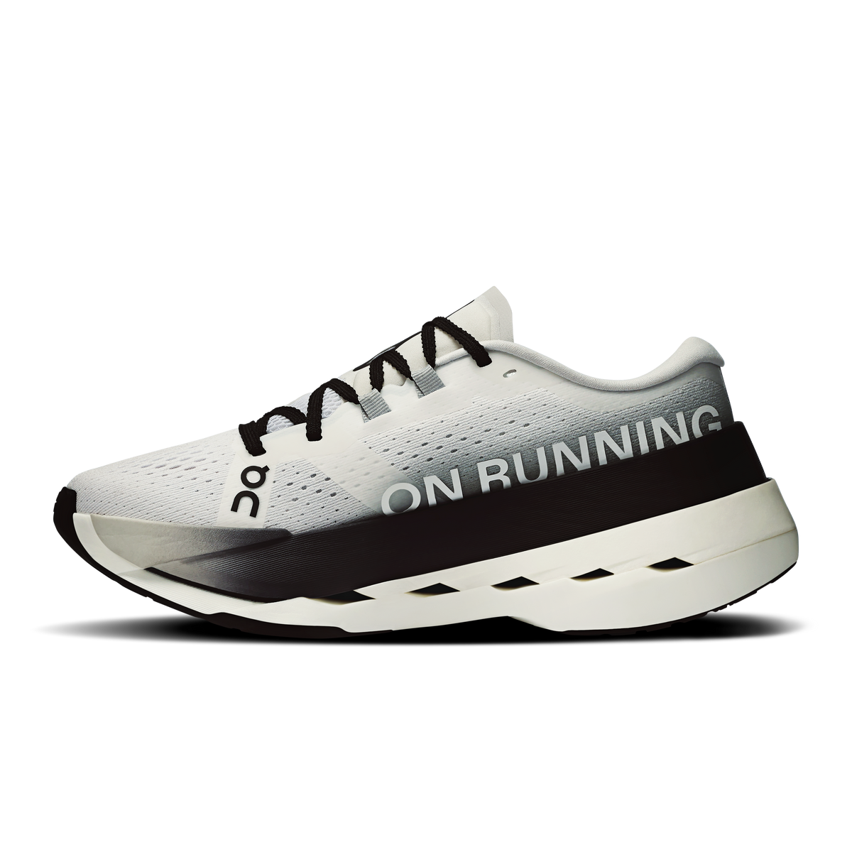 Women's On Cloudboom Max shoe with white upper, black trim, and ON RUNNING logo