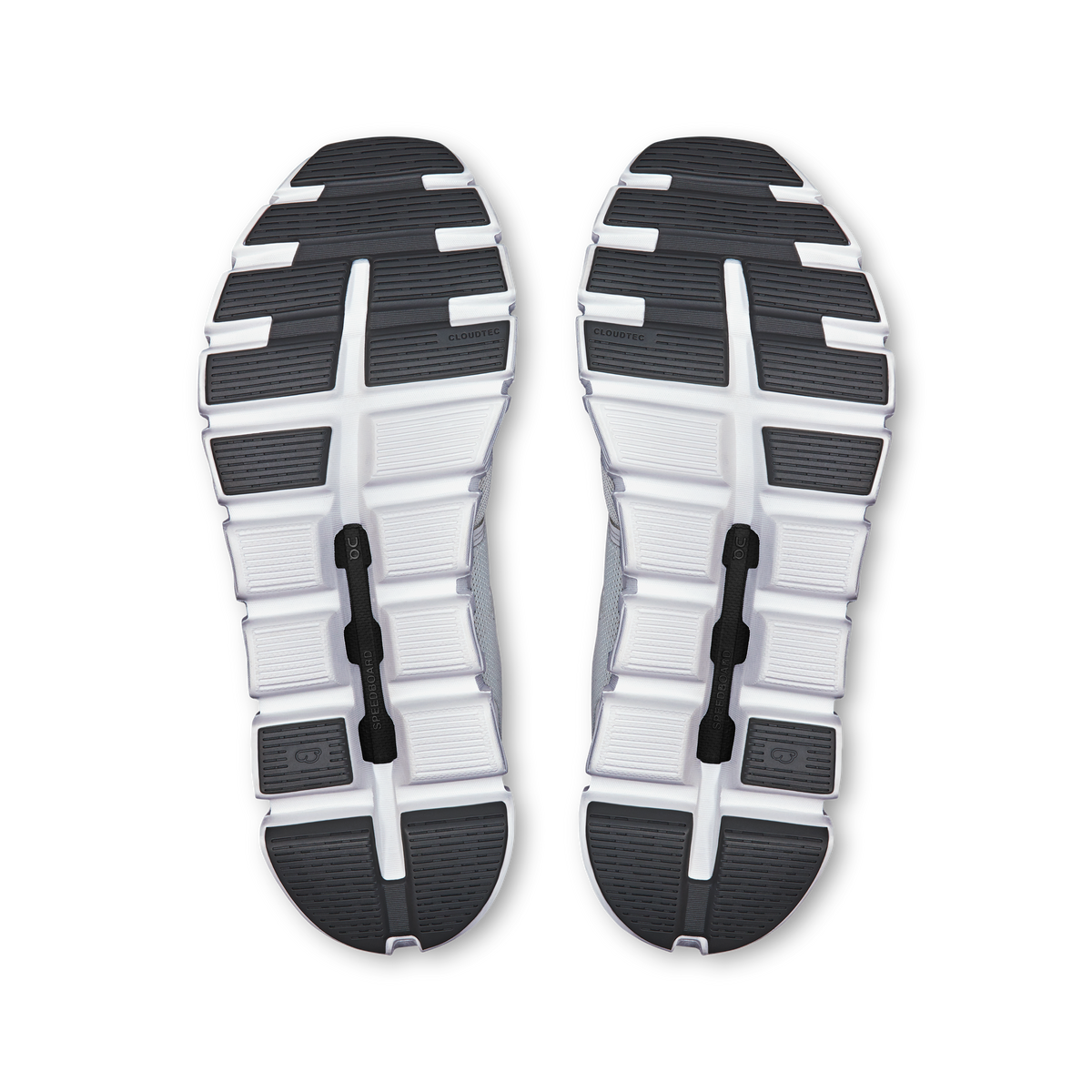 Pair of On Cloud 6 shoes showing white-and-dark treaded outsoles