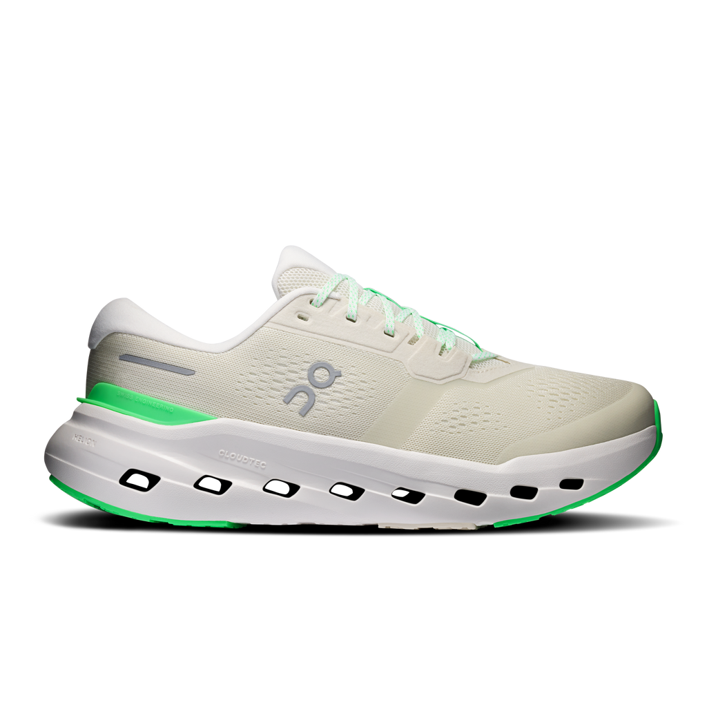 Men's wide running shoe in light cream with green accents, lace-up, cushioned sole