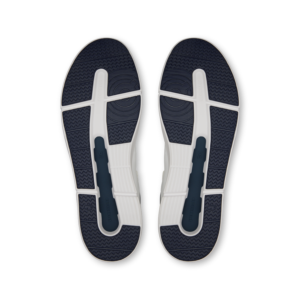 Rubber outsole soles for white and midnight blue Roger sneakers with traction pattern