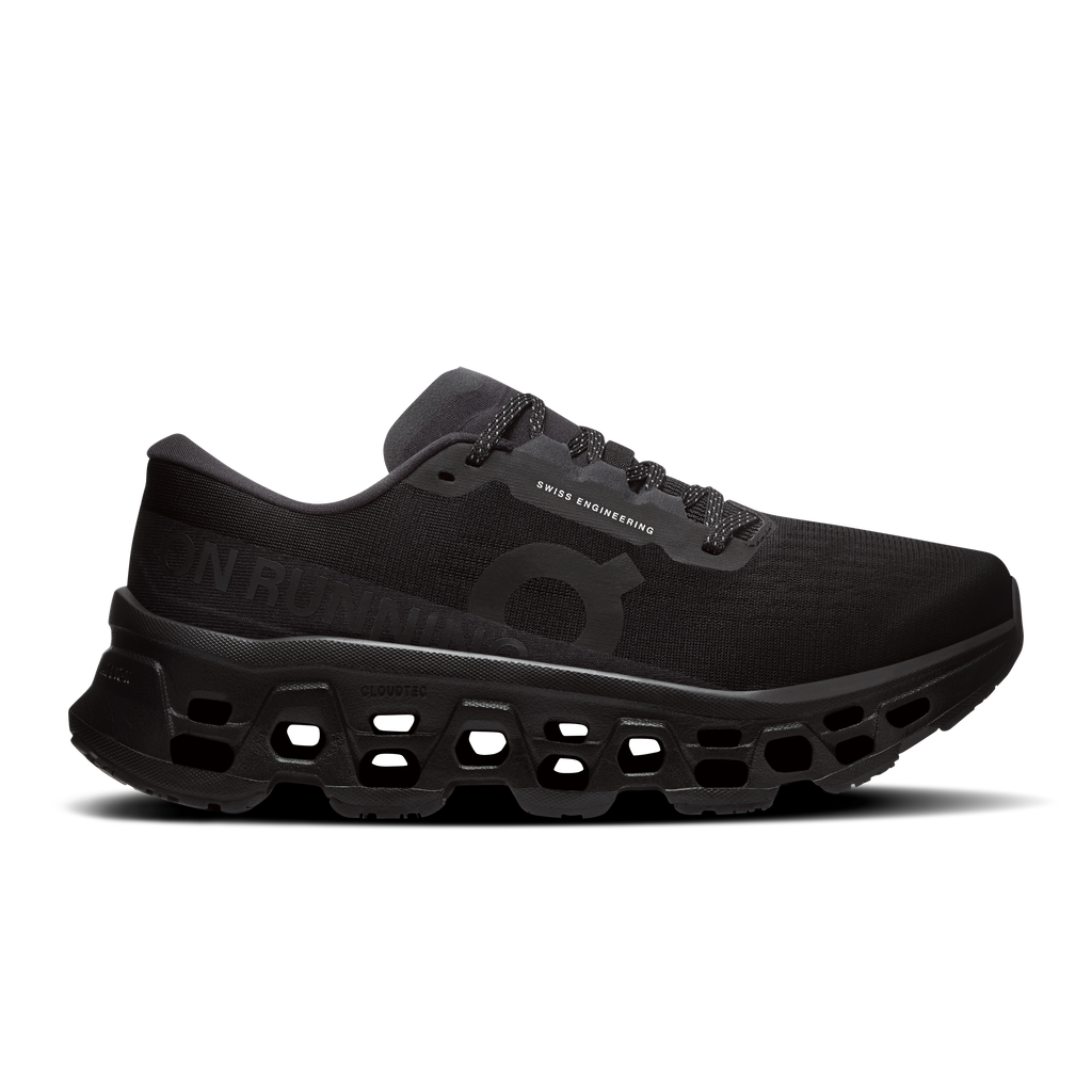 Women's black running shoes with mesh upper and CloudTec-style rubber outsole