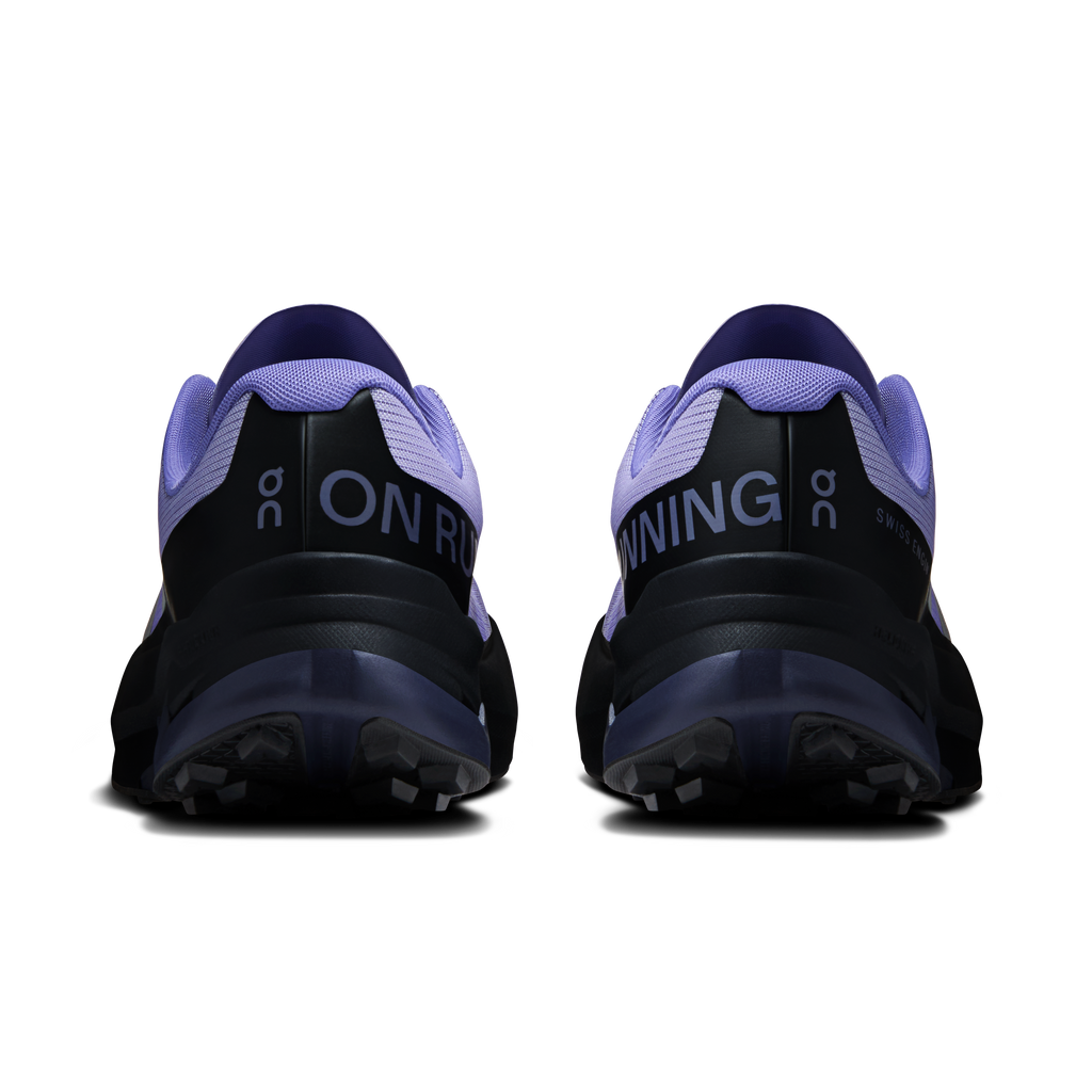 Women's running shoes heel view, lilac upper with black panels and On branding