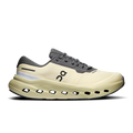 Women's waterproof running shoes in pale yellow with dark gray lace-up uppers.