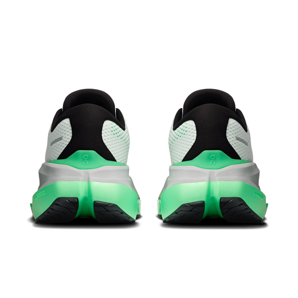 Shoe heel view: black collar and heel cup with white mesh and green midsole
