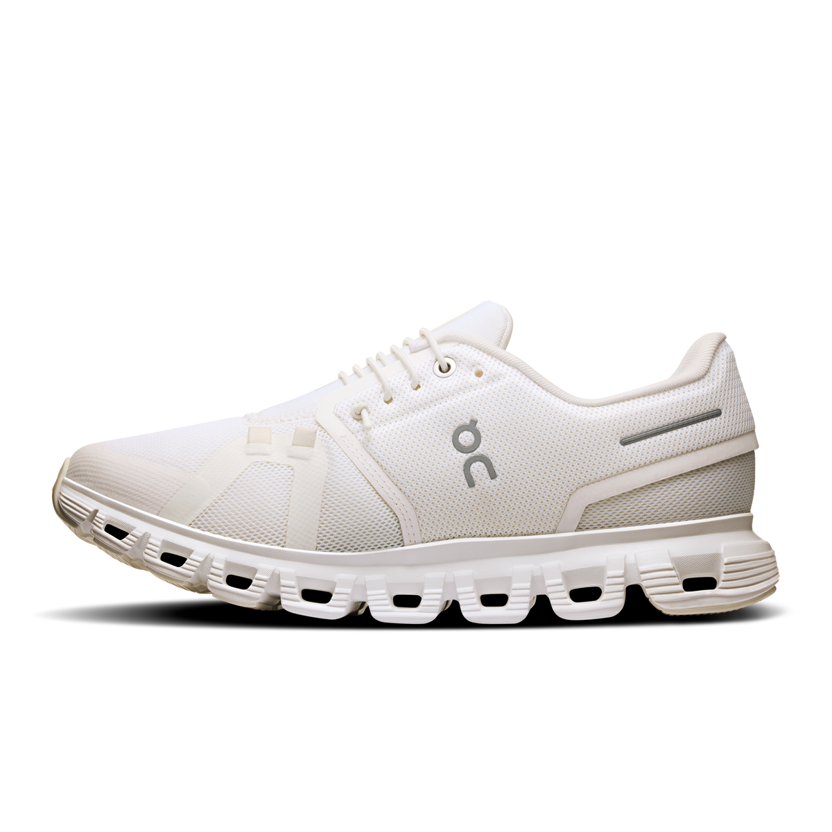 Women's white wide lace-up running shoe with cushioned midsole and mesh upper