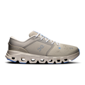 Men's running shoes in light gray with blue accents, lace-up.