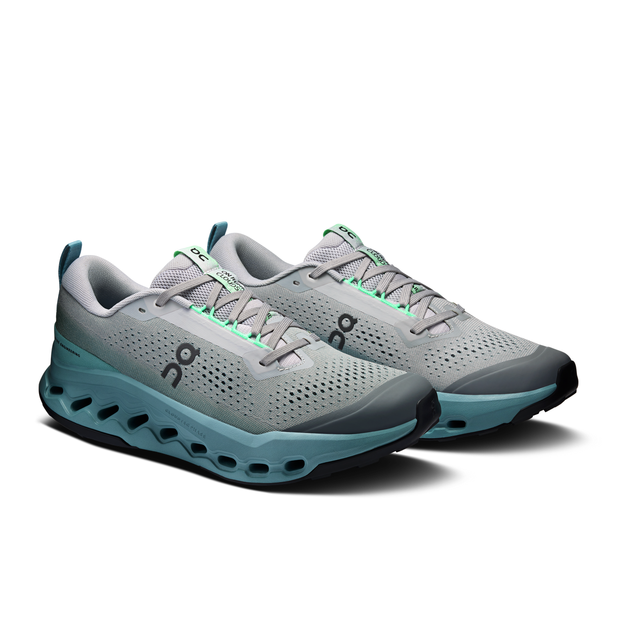 Men's trail running shoes in light gray mesh with teal outsole and neon green laces.