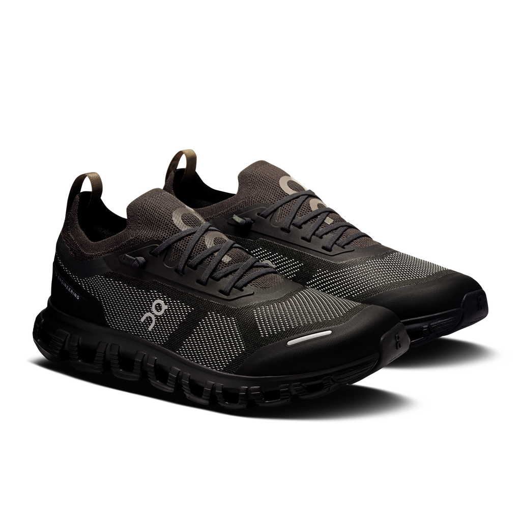 Women\u2019s black running shoes, front 3/4 view, lace-up mesh upper and cushioned sole