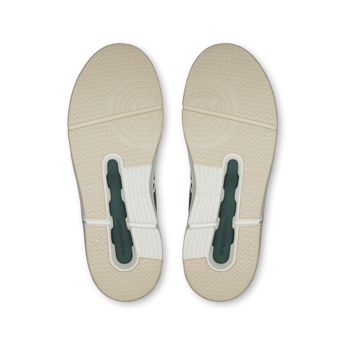 Women's sneaker outsole in light beige with dark heel inserts and traction pattern