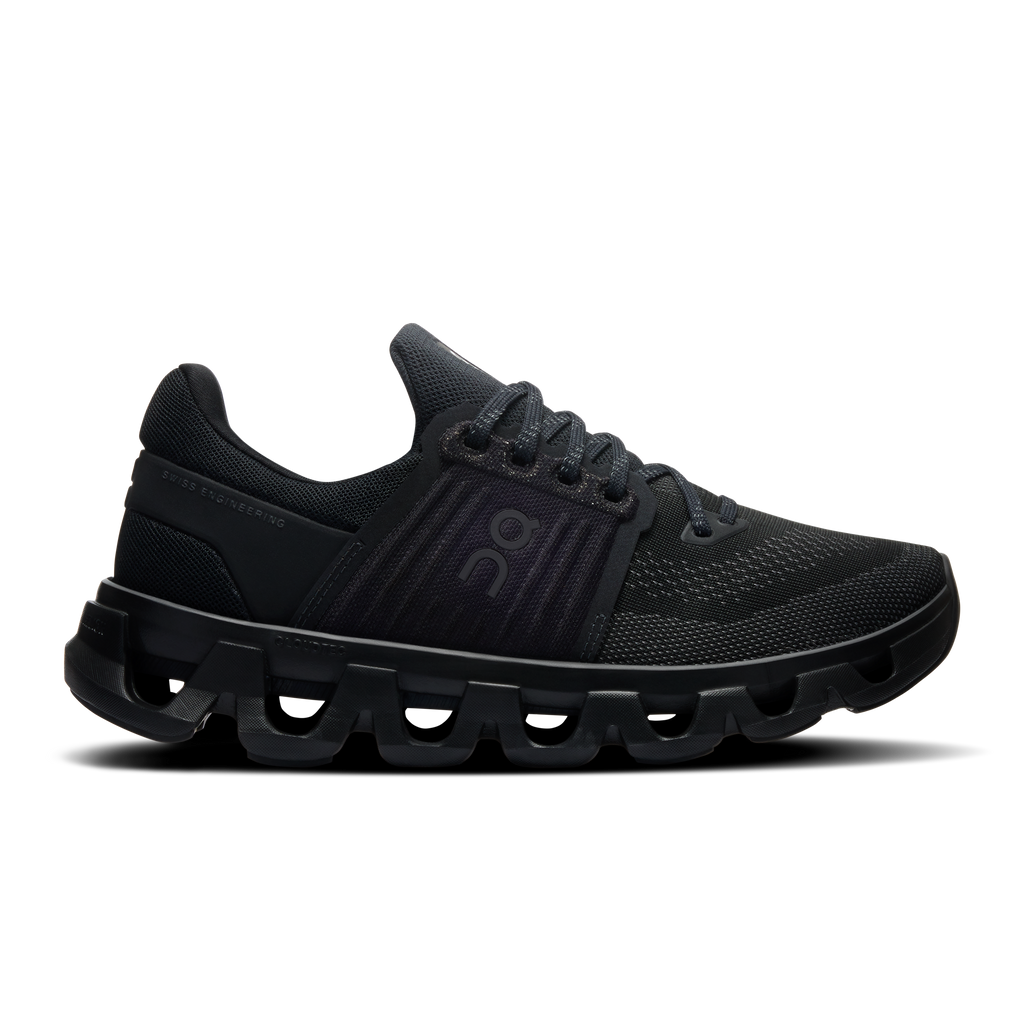 Women's black running shoes with CloudTec outsole and mesh upper