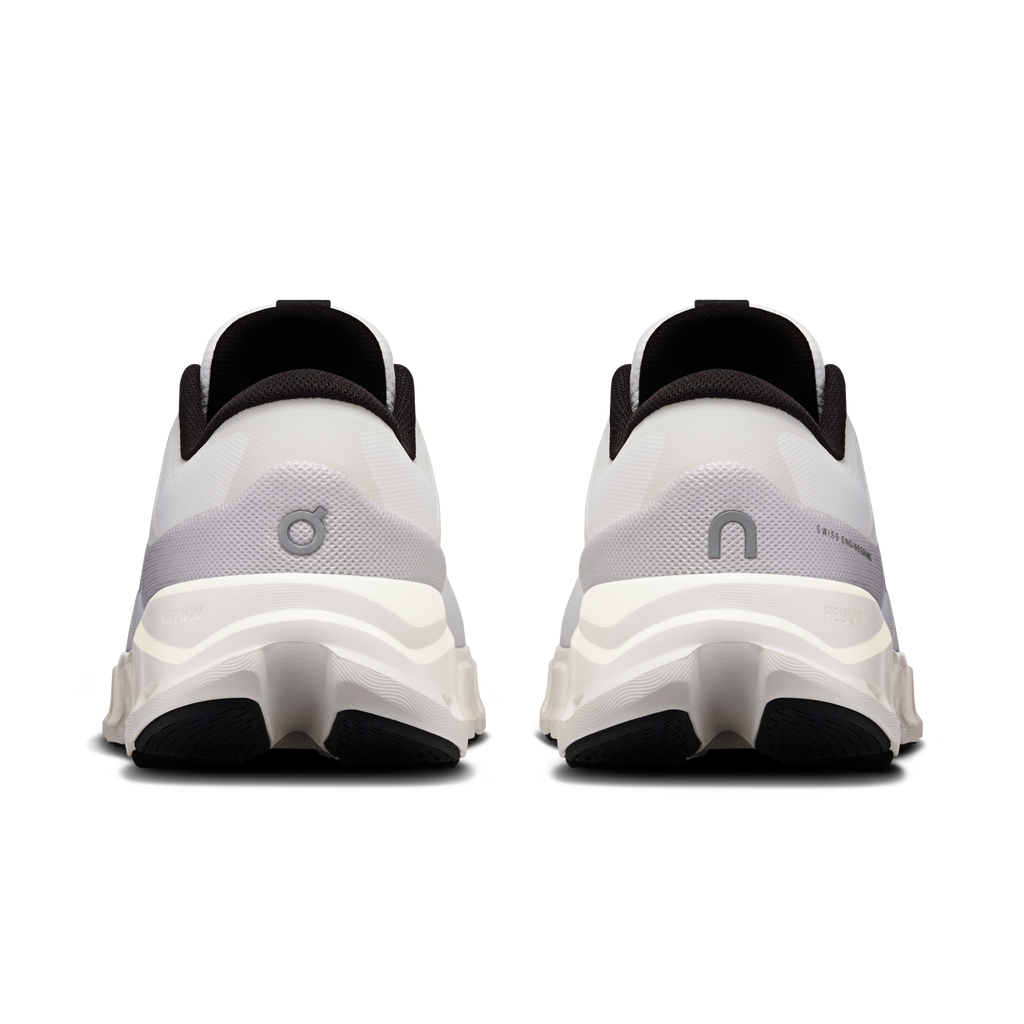 Women's white running shoes rear view with dark heel lining