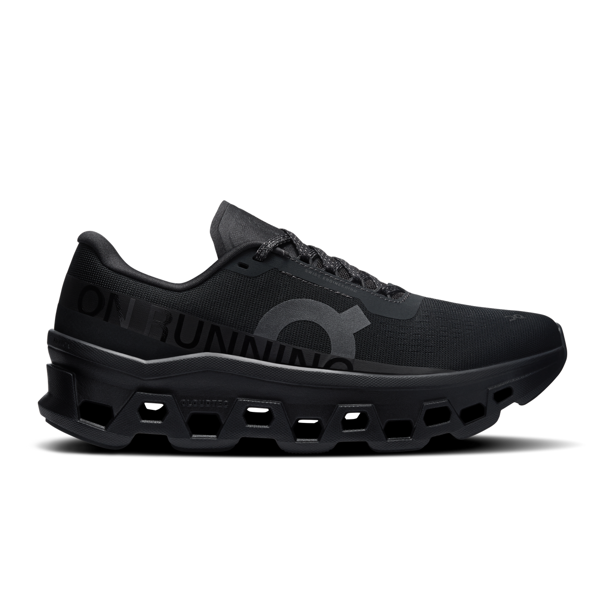 On Cloudmonster 1 women's black running shoes, lace-up side view with mesh upper.