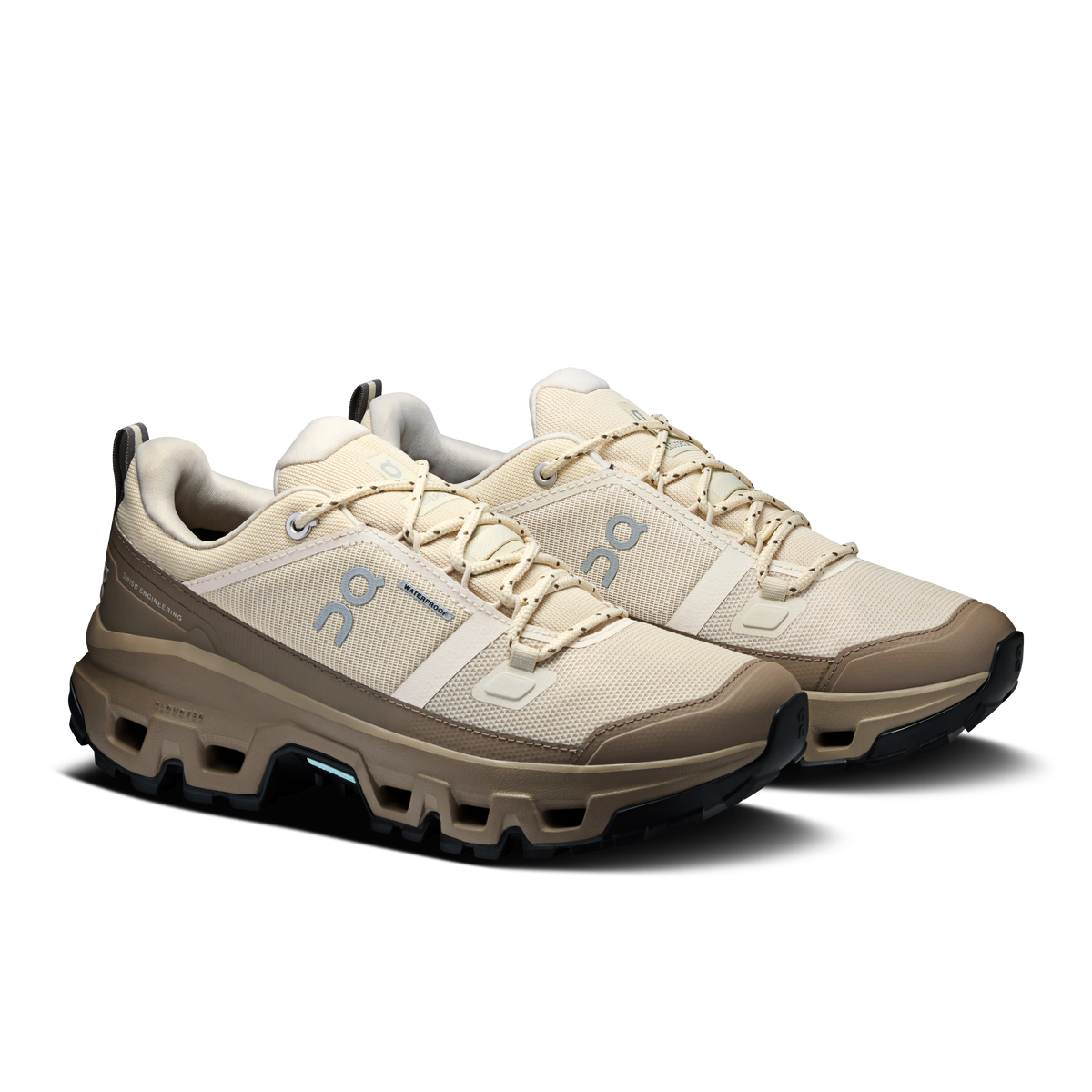 Pair of women's waterproof low-top running shoes, cream uppers with beige side panels