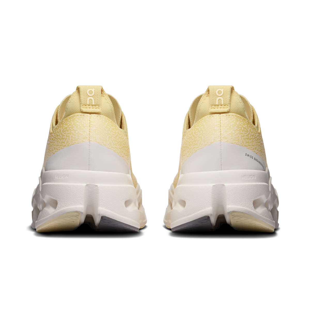Women's yellow running shoes rear view with white heel and gray outsole detailing