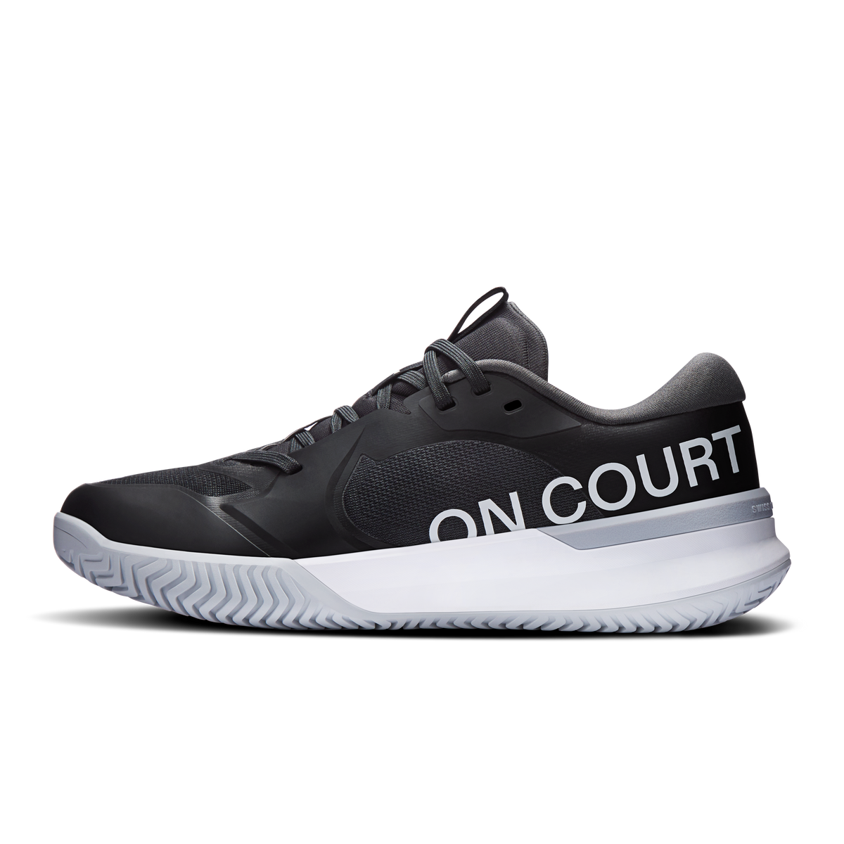 Women's black court shoe with 'ON COURT' side text, white midsole and pink accent