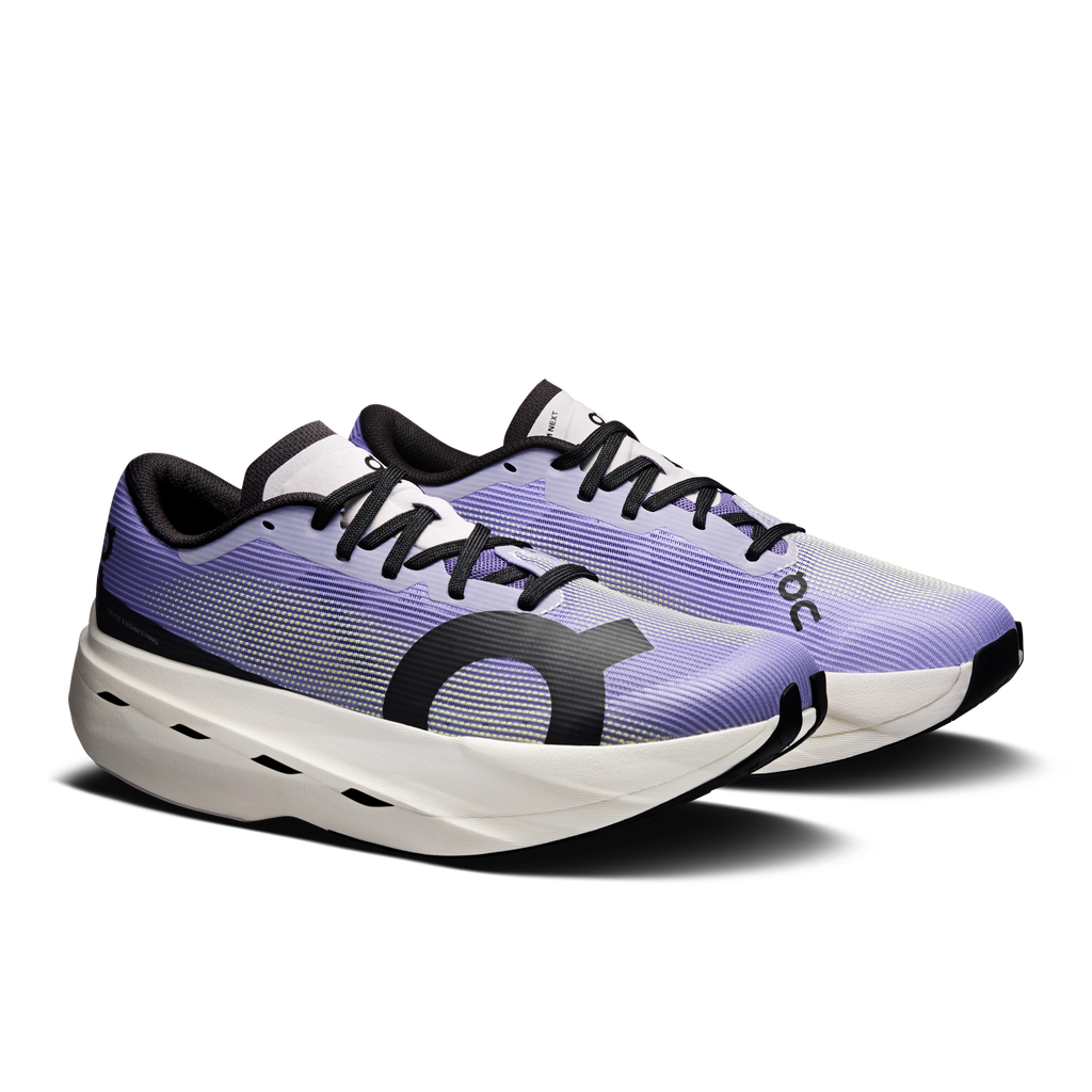 On Cloudboom Volt running shoes, purple knit upper with black and white sole