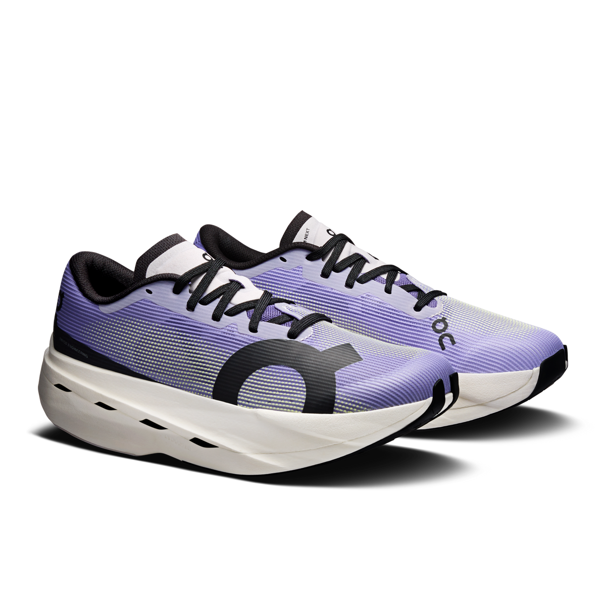 On Cloudboom Volt running shoes, purple knit upper with black and white sole