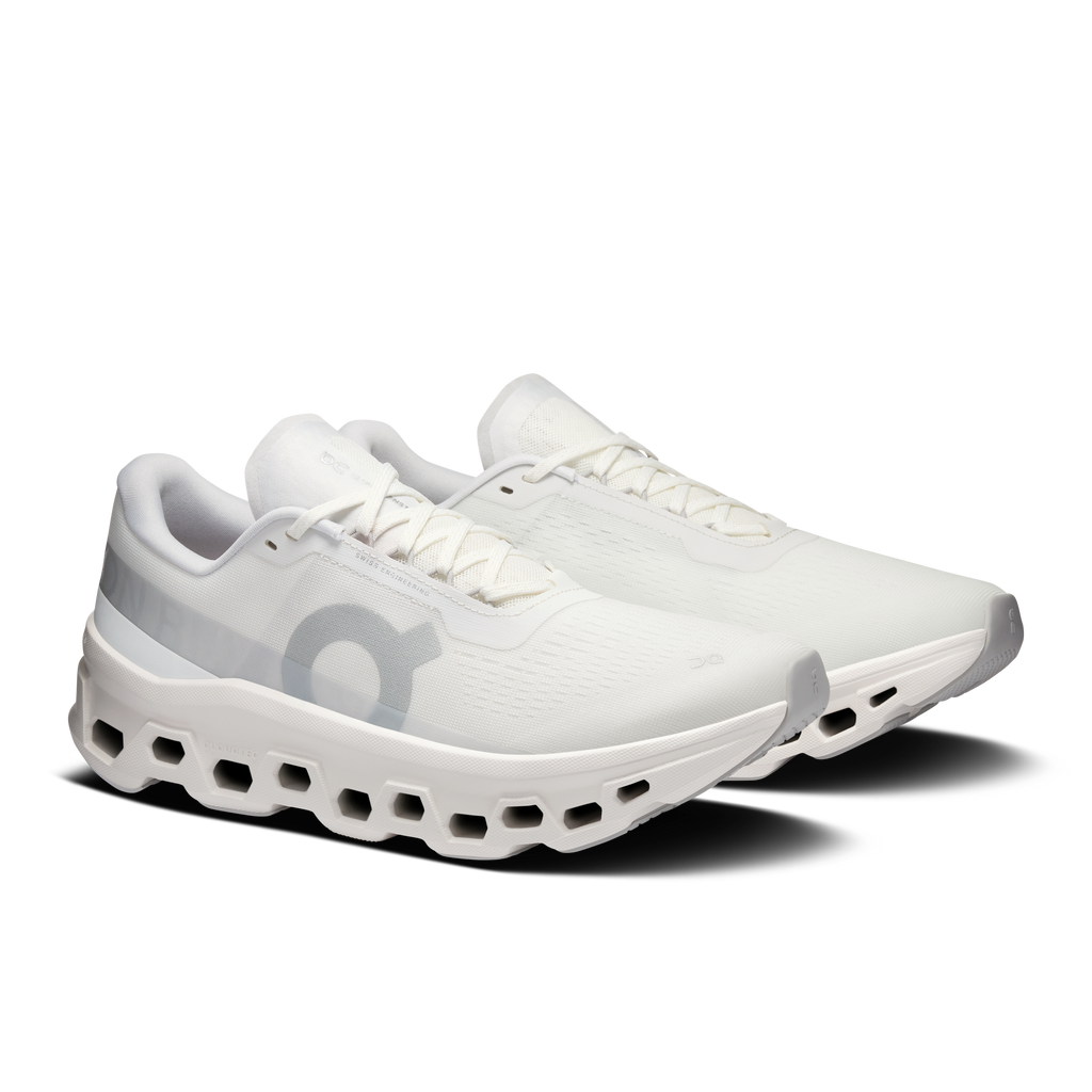 Men's white running shoes, side view with lace-up and pod outsole