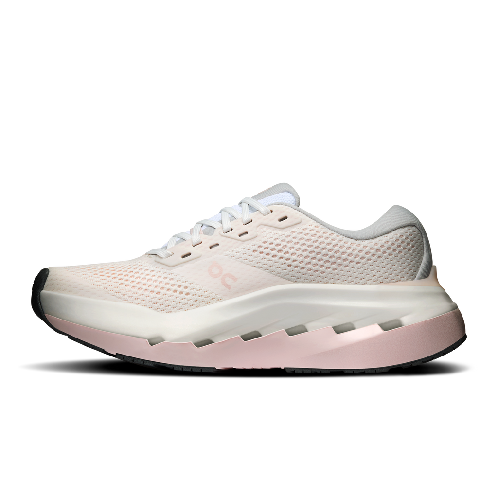 White lace-up running shoe with mesh upper and light-pink cushioned sole