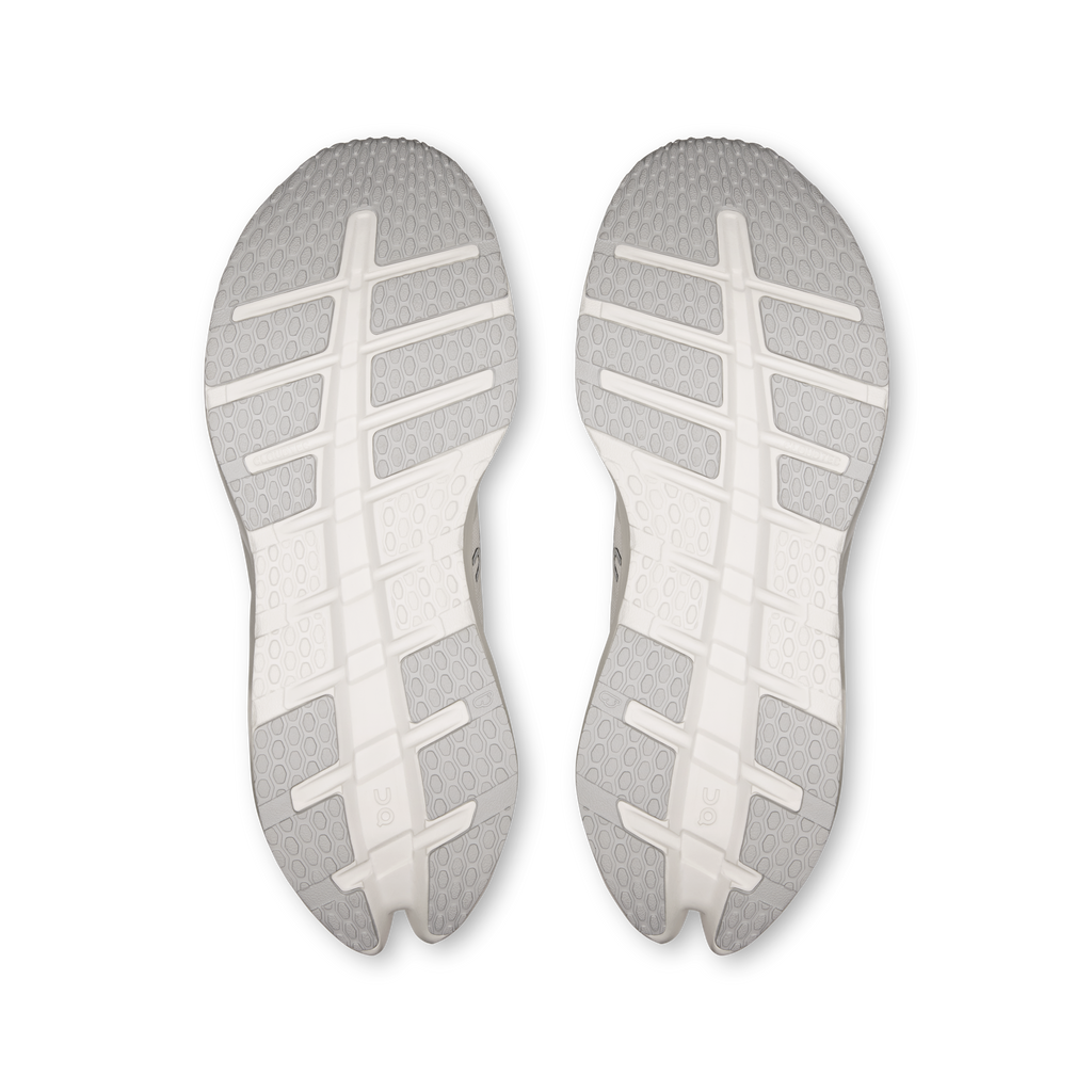 White shoe outsoles with textured tread and reinforced toe for traction