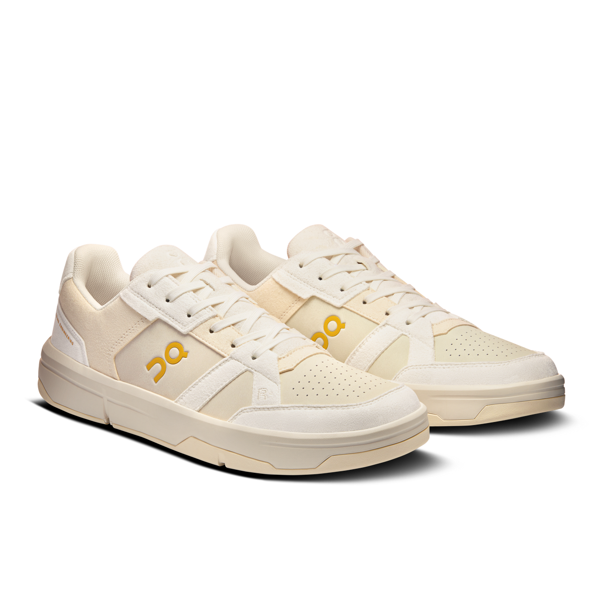 Ivory low-top On Roger Ace sneakers with dual logos and lace-up vamp